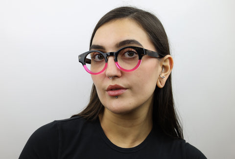 Woman wearing these luxury designer SEE Eyeglasses