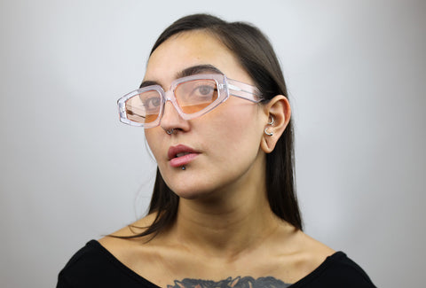 Woman wearing these luxury designer SEE Eyeglasses
