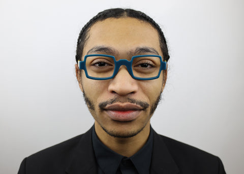 man wearing these luxury designer SEE Eyeglasses