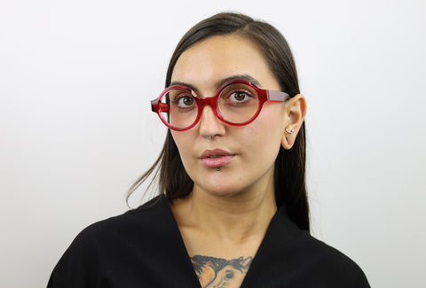 Woman wearing these luxury designer SEE Eyeglasses