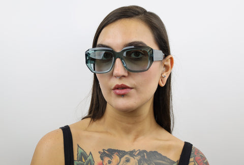 Woman wearing these luxury designer SEE sunglasses