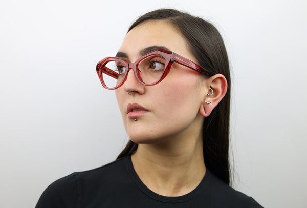Woman wearing these luxury designer SEE Eyeglasses