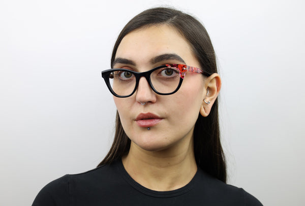 Woman wearing these luxury designer SEE Eyeglasses